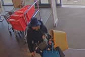 Footage of Tanya Liddle using a hat as disguise in one of her shoplifting ploys