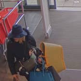 Footage of Tanya Liddle using a hat as disguise in one of her shoplifting ploys