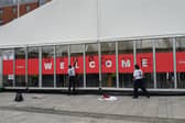 Protesters spray paint 'genocide’ on Labour conference entrance.