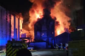 Firefighters tackling a huge fire at the former Dog Inn on Church Street, Preston