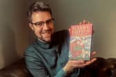 Expert Jim Spencer, with the Harry Potter first edition bought by Christine McCulloch after watching Blue Peter in 1997