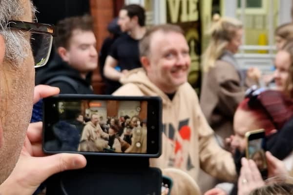 Chris McCausland poses for selfies outside Blackpool Tower during Strictly Come Dancing visit.