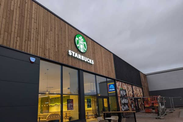 A new Starbucks shop has opened while work starts on a new Nando's at a Derby retail park.
