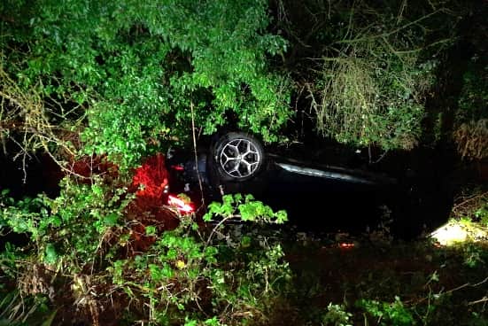 Sian Phillips' overturned car.