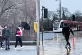 Pedestrians battle Storm Éowyn’s strong winds on Princes Street.