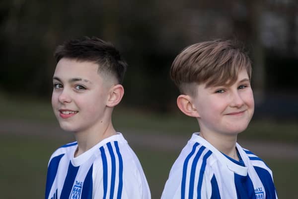 Flo Topham (L) and Camille Porhel, who play for York Railway Institute (YRI) AFC u12s Girls, have launched a campaign defending their right to have short hair, after they were accused of being boys during a game. 