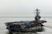 A fighter jet fell off the side of the American aircraft carrier USS Harry S. Truman while she was deployed in the Red Sea.
