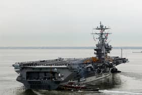 A fighter jet fell off the side of the American aircraft carrier USS Harry S. Truman while she was deployed in the Red Sea.