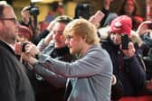 Getting everyone in the shot is Brits biggest frustration when it comes to taking group shots