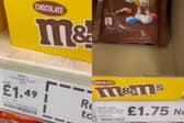 New bag of M&Ms costs same price as old bag but weighs 13g less.