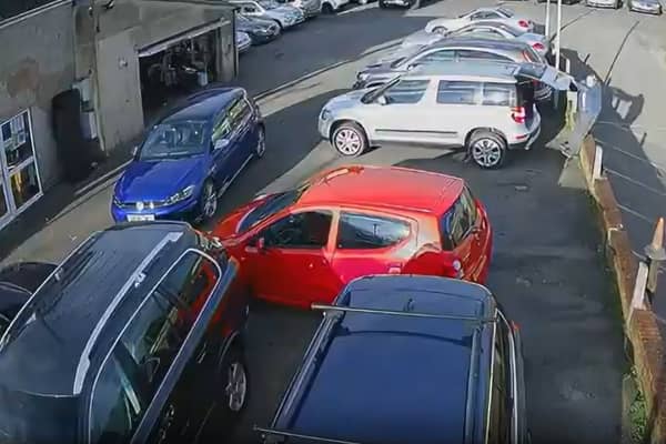 A car dealer must pay more than £9,000 in fines and costs after a visitor to his premises was seriously injured when he fell down an unprotected drop. 