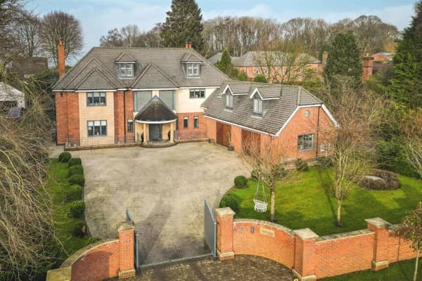 This five-bedroom house in the sought-after village of Quarndon boasts a 'magnificent' entrance hall and a 'beautiful' living/kitchen/dining room/snug/kitchen. There's a luxury cinema room with its own bar, two gyms, a shower/steam room, and private landscaped gardens.