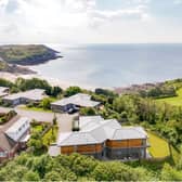 The Gower Peninsula in Swansea is one of the best places to live in the UK, according to the Sunday Times. This fabulous four-bedroom house looks out over Langland Bay, with its lovely sunny beach, and the nearby golf course.