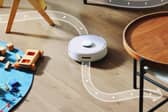The SwitchBot K10+ is small enough to get around furniture other robots can't navigate