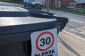 Bin 30 sign