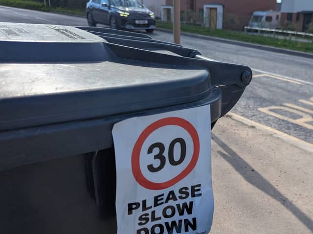 Bin 30 sign