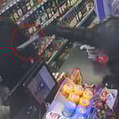Balaclava-clad teen threatens shop owner at knifepoint.