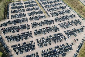 Aerial views of hundreds of vehicles ready to be distributed at the Jaguar Land Rover National Distribution Centre 