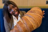 Emmanuella Okpoko with the massive croissant at P&D Gran Caffè in Liverpool.