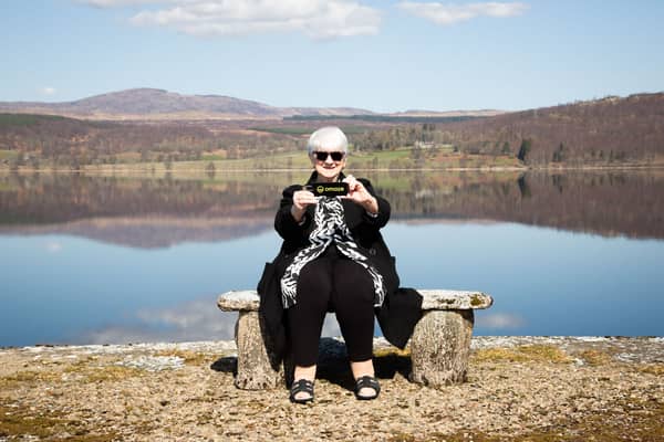 Patricia Moule,  Omaze Winner outside her new £4m home in Scotland.