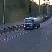 Driver travels towards oncoming traffic on dual carriageway.