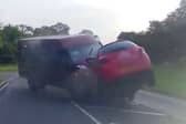 Minibus smashes head-on into car - seriously injuring three.