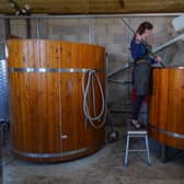 Gin distiller Mel prepares the next batch of gin at the highest-altitude distillery in the UK, standing at 1,689 feet above sea level, is the Forest Distillery, located at the Cat & Fiddle Inn