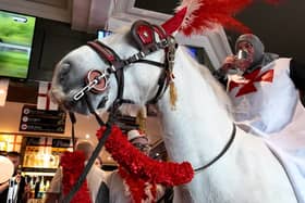 Landlord Chris Bracegirdle rides into the Bloomfield Brewhouse on horseback for St Georges Day.