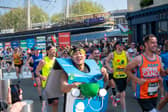 Man runs marathon dressed in Domino's Pizza box