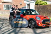 Andrew Heal woke up to see a familiar face at the door - and then he was given a massive prize