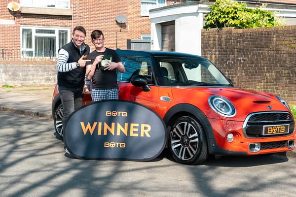 Andrew Heal woke up to see a familiar face at the door - and then he was given a massive prize