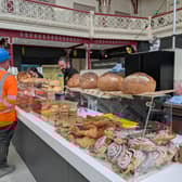 Ahead of the big Derby Market Hall launch, we chatted to traders and people behind the scenes. Pictured are workmen trying baked delights at Olivia's Coffee & Bakery on the ground floor.