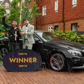 Ali Mohammed (right) popped a bottle of Champagne to toast his huge win