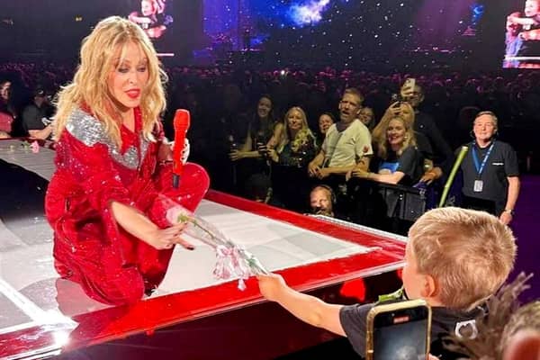 Reuben Borley-Walton was serenaded by Kylie Minogue after he gifted her a rose during her performance in Birmingham. 
