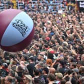 The Villa Park crowd plays with a huge beach ball as they watch support acts, during British rock band Black Sabbath's "Back to The Beginning" concert, Ozzy Osbourne's final ever gig as Black Sabbath's frontman at Villa Park in Birmingham