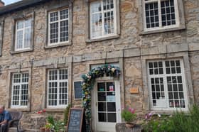 Melbourne is a gorgeous Derbyshire market town that has retained its heritage and is filled with charming buildings and traditional tea rooms. Pictured is Melbourne Hall Tea Rooms overlooking a rustic courtyard.