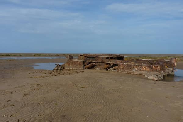 The remains of a tank on the beach at Saltfleetby