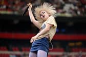Paramore lead singer Hayley Williams has surprised fans with a secret 17 tracks drop - by virtue of a 16 digit code available to those who bought from her hair dye company.
