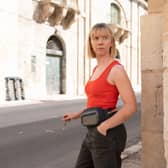 Lauren Lyle as Karen Pirie. 