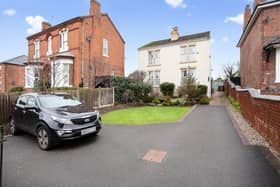 A handsome detached home on Nottingham Road with strong kerb appeal and generous proportions