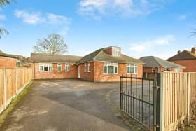 Set behind a secure gated entrance, this spacious detached bungalow in Littleover enjoys a generous plot with ample driveway parking and a strong sense of privacy from the road