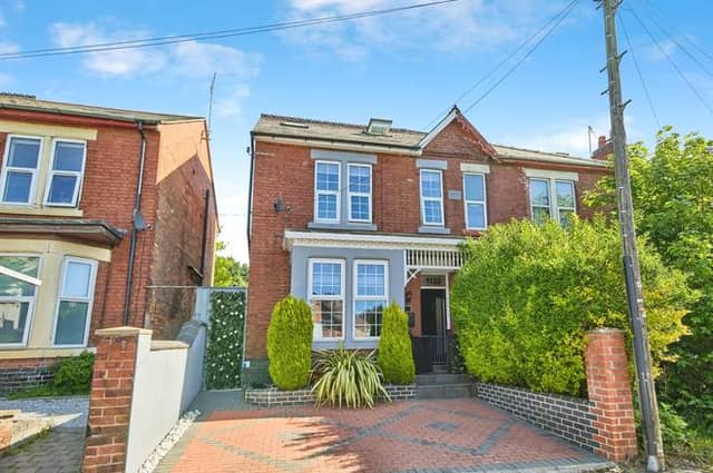 This substantial semi-detached home on London Road combines traditional character with modern upgrades, offering impressive space across three floors