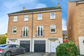 A four-bedroom semi-detached house that is for sale on Badgerdale Way, Derby.