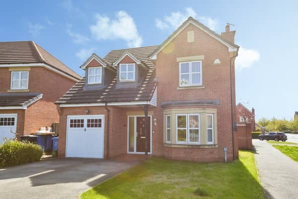 The detached Chellaston property occupies a generous corner plot within a modern development