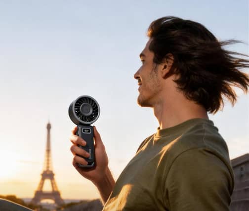 The Diveblues handheld turbo fan folds down into a compact travel-friendly design with adjustable cooling speeds