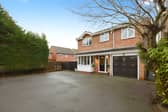 The generous driveway and detached family design create an impressive welcome before stepping inside.