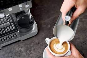The Ninja Luxe Café Premier Espresso Machine in grey is designed to make espresso, cappuccinos and lattes with automated brewing features.