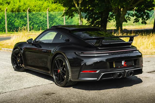 The black Porsche 911 GTS can accelerate from 0-60mph in three seconds and comes with a £125,000 cash alternative