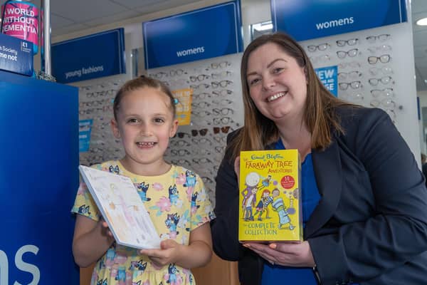 Scrivens 'Design a Book' competition winner Isobel Colson-Walters, aged 5 with Scrivens Heanor branch manager, Stephanie Jarvis