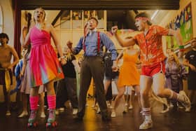 Kira (Left, performed by Lauren Turner), Danny (Centre, performed by Gareth Elvidge) and Sonny (Right, performed by Matthew Alsop) dancing to ELOs classic hit 'All over the world'